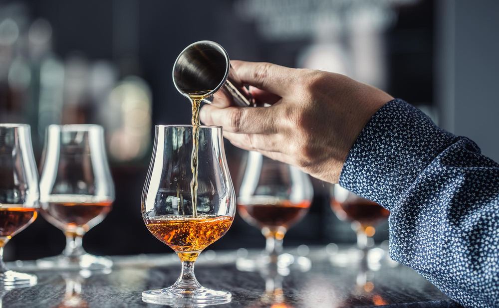 Measuring a whisky pour