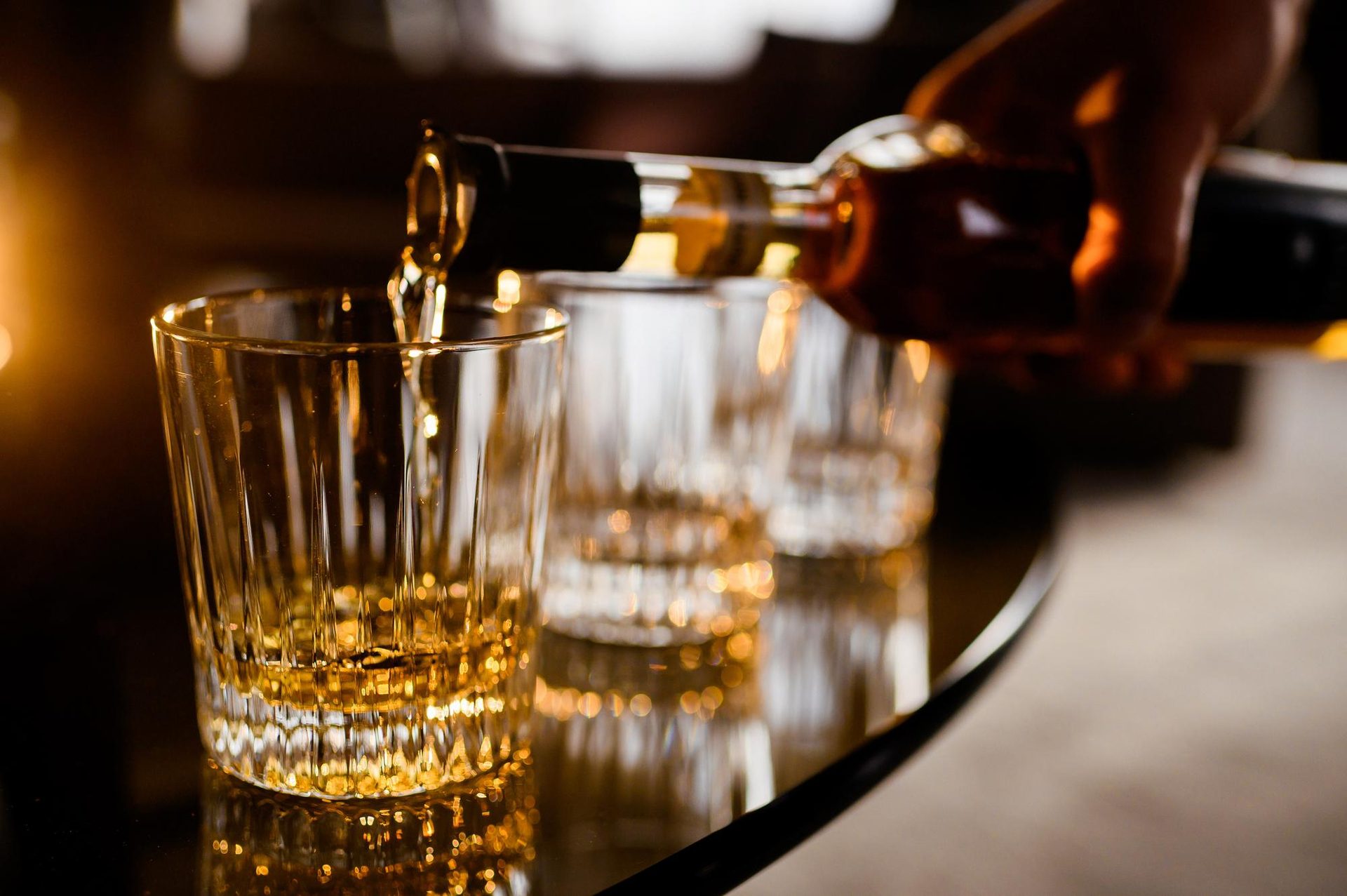Whisky being poured into a glass